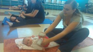 Amanda and baby at yoga class